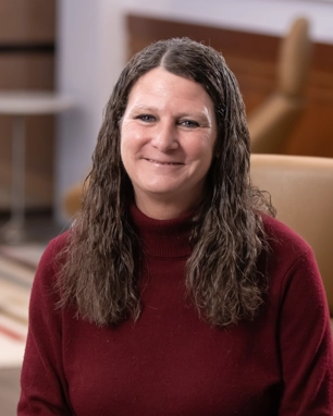 smiling person in business attire